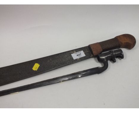 A VINTAGE BAYONET, TOGETHER WITH A WOODEN HANDLED MARTINDALE CROCODILE MACHETE 