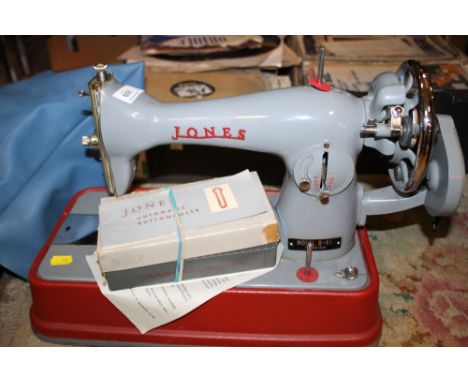 A VINTAGE JONES SEWING MACHINE