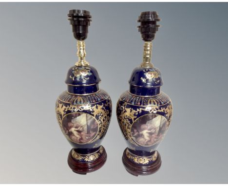 A pair of French style gilt porcelain lamp bases.