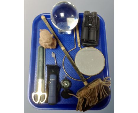 A tray containing compass, monocular, a pair of 16x32 binoculars, crystal ball, brass mirror etc.