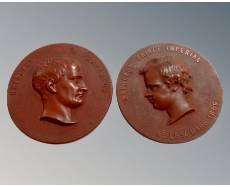 Two French Bois Durci circular portrait plaques depicting Napoleon I and Prince Napoleon (diameter 11cm).