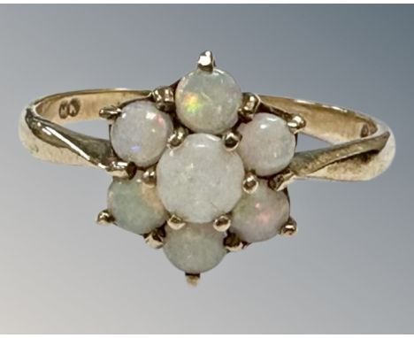 A 9ct gold opal cluster ring, cluster diameter 9 mm, size L, 1.5g.