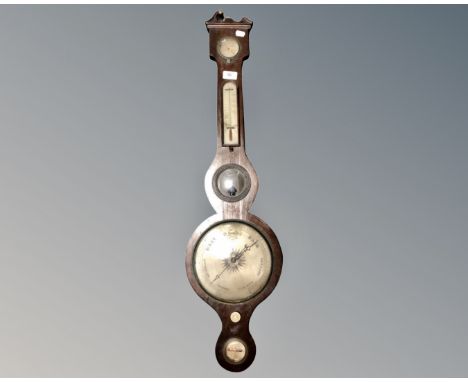 A George III barometer with silvered dial.