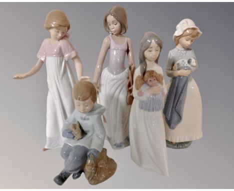 A group of five Nao figures of children.