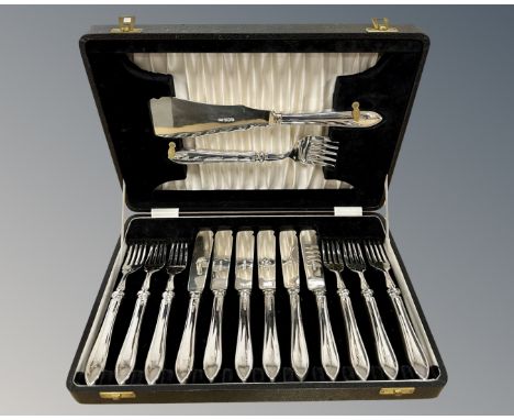 A canteen of silver fish cutlery, six place setting with serving knife and fork, solid silver including handles, 1959 Sheffie