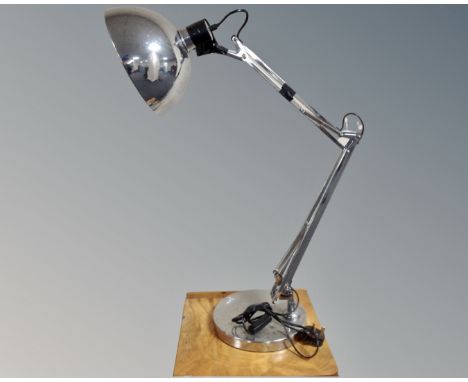 A contemporary angle poise table lamp.