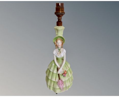 A Continental figural porcelain lamp base (height 29cm) CONDITION REPORT: Not wired.