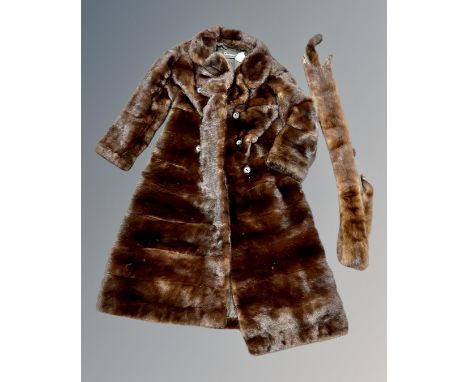 An early 20th century mink fur coat by Christian Dior Furs, including stole, the lining fully stitched with Christian Dior si