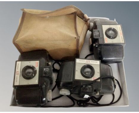 Three vintage Kodak Brownie 127 cameras.