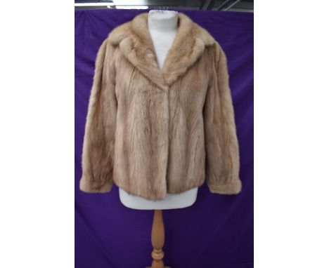 A short vintage blonde mink coat.