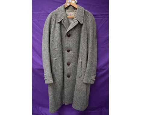 A gents vintage 1950s overcoat  by Dunn and Co 'Cloth made by Crombie, Aberdeen, Scotland', single breasted with vent to back