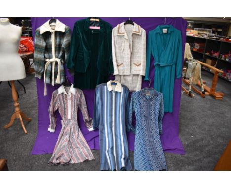 A collection of vintage and retro Ladies clothing in a mixture of colours and styles, including velvet suit,dresses and coat.