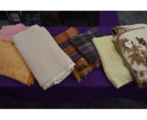 Seven vintage and retro bed covers,throws and blankets.