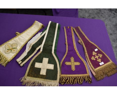 Four vintage priests stoles having fringed edges.