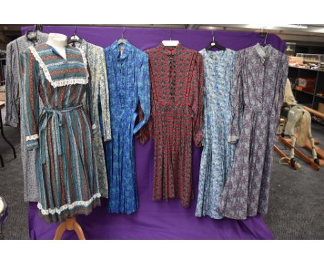 A selection of vintage and retro Ladies dresses in a variety of fabrics, patterns and styles.