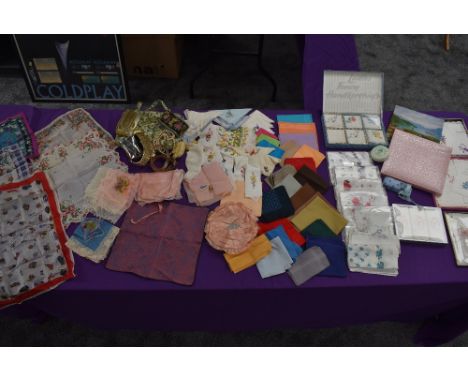 A huge array of vintage and antique handkerchiefs,some still in packaging,belts and accessories also included.