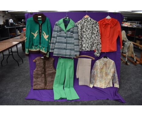 A selection of vintage ladies clothing including blouses, rabbit fur waistcoat,chunky green knitted cardigan with zip front a
