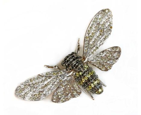 A white gold black diamond, diamond and fancy diamond, bee brooch,with black diamonds, pavé set to the head and thorax. The a
