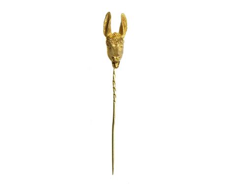 A gold donkey or ass novelty stick pin, late 19th century or early 20th century,with a naturalistic donkey's head with textur