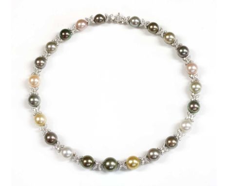 A Continental white gold Tahitian and South Sea cultured pearl and diamond necklace,a series of graduated Tahitian and South 