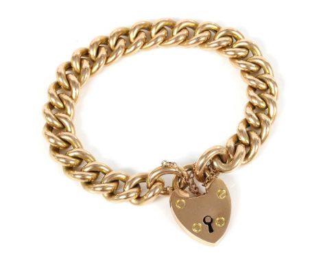 An Edwardian 15ct gold curb bracelet, by S Blanckensee and Sons Ltd.,with a padlock clasp and safety chain, Chester 1907. 10-