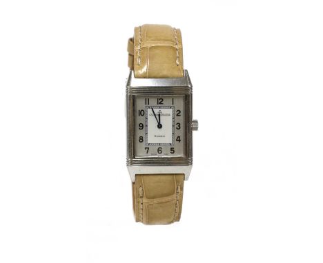 A stainless steel Jaeger LeCoultre 'Reverso' mechanical strap watch,252.8.86, with a 38 x 23mm case. A silvered dial with sat