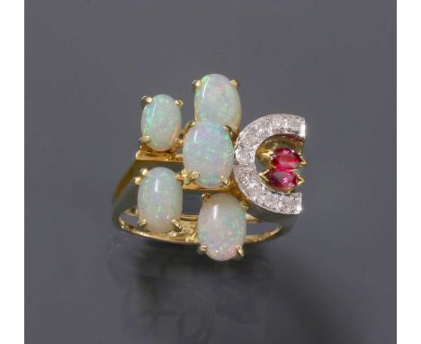 A Continental opal, ruby and diamond asymmetrical cluster ring, c.1970,with five graduated oval cabochon opals, claw set to o