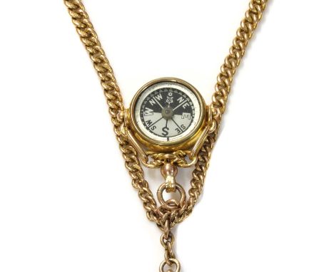 A 9ct gold curb link double albert chain,with a 9ct bloodstone compass fob, with a fetter and knot mount, and a 9ct gold engi