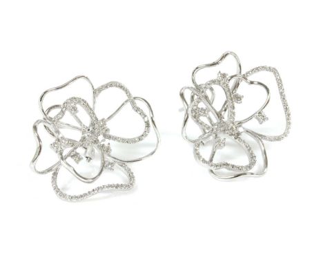 A pair of 18ct white gold diamond set ghost rose earrings,with lines of brilliant cut diamonds, micro claw set to open rose p