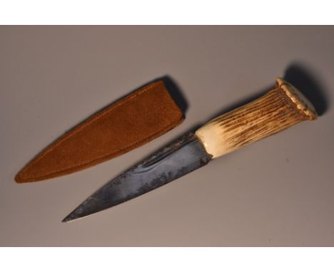 A Scottish sgian dubh, by G.B. Wilson, Pitlochry, 9cm blade, stag antler haft, leather scabbard, 17.5cm long overall