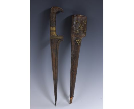 A 19th century pesh kabz dagger, 26cm straight tapered blade with broad spine, brass-mounted hilt, two-piece horn grip decora