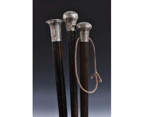 An early 20th century silver mounted gentleman's walking cane, engine turned pommel, hardwood shaft, 90cm long, c.1920; other