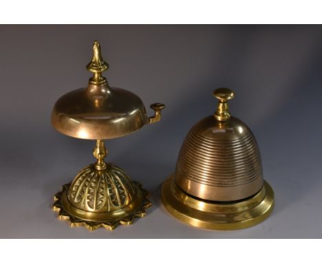 A Victorian brass counter push-bell, as a beehive, skirted circular base, 12cm high, c. 1900; a 19th century brass counter be