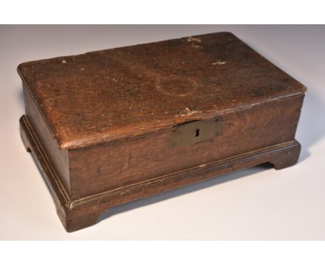 An 18th century oak rectangular document box, hinged cover, skirted base, bracket feet, 39.5cm wide