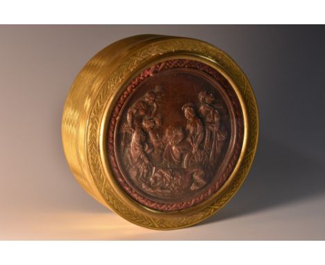 A 19th century gilt metal circular table box, the push-fitting cover set with an electrotype roundel depicting Britannia paid