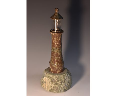 A Cornish serpentine table lamp, as a lighthouse, 35cm high, early to mid-20th century