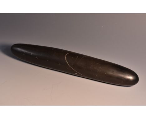 Tribal Art - a veined black marble roller or pestle, 24.5cm long 