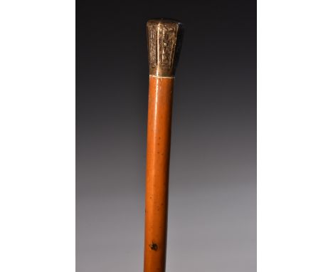 A Chinese silver mounted malacca gentleman's walking cane, the hexagonal pommel embossed with alternating bands of figures, l