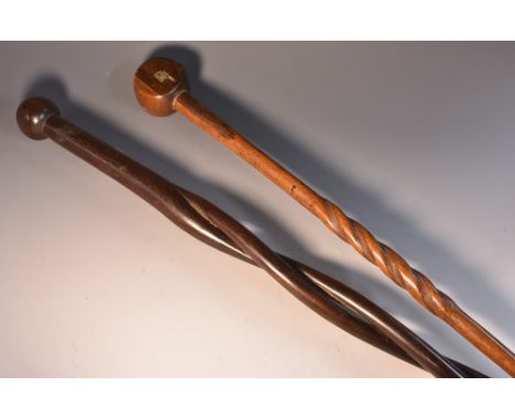 Tribal Art - a Zulu hardwood status staff or stick, globular head, open-twist shaft, 98.5cm long, c.1900; another (2)