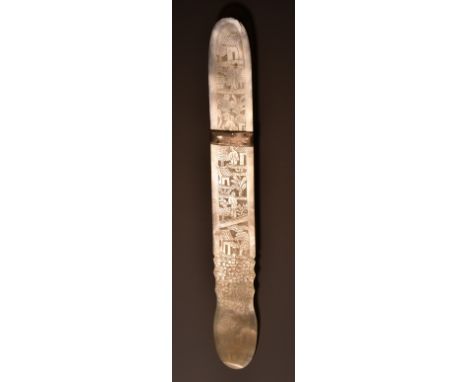 An early 19th century Chinese Export mother-of-pearl paper knife, carved in relief with a vertical panorama of traditional fi