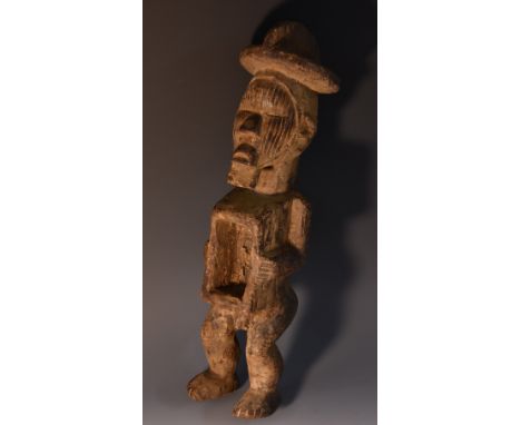 Tribal Art - a Nkysi fetish or power figure, standing, his arms flanking a niche at his waist, 39cm high, Congo Basin 