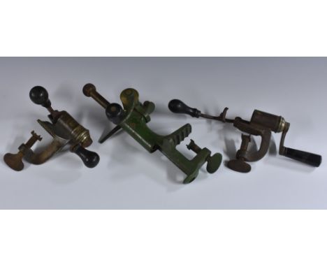 Shooting - a 19th century cast iron bench-mounted cartridge loader,  26.5cm long; others (3) 