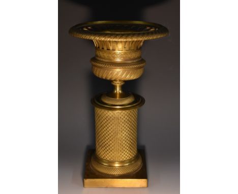 A 19th century French Empire design gilt-brass campagna shaped comport, engine turned throughout with guilloché and diapers, 