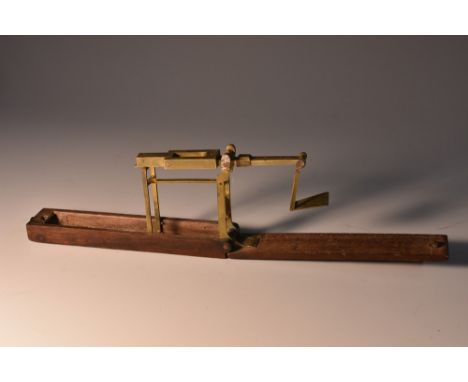 A George III mahogany and brass folding sovereign balance, by A Wilkinson, Ormskirk, Lancashire, paper label, 20.5cm wide (op