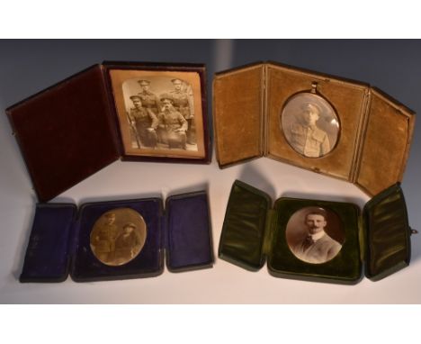 Photography - World War I - a group studio portrait, four soldiers, two osed with rifles, arched mount, morocco case; another