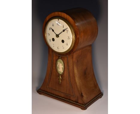 An Edwardian jasperware mounted mahogany ballon shaped mantel clock, 10.5cm convex enamel dial inscribed with Arabic numerals