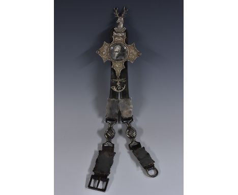 Friendly Society - Freemasonry - a 19th century silver mounted leather regalia chatelaine, the lower straps with grasped hand