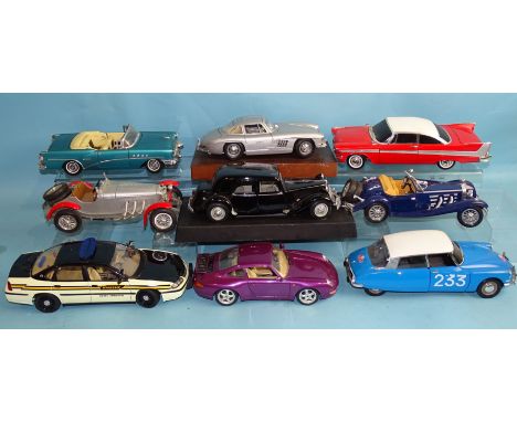 Fourteen unboxed diecast scale model cars, mainly 1:18 Maisto and Burago, (14). 