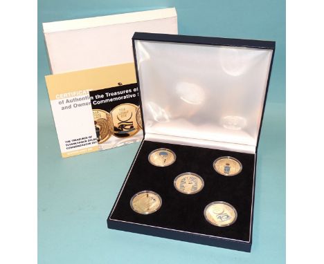 The London Mint, 'The Treasures of Tutankhamun Golden Commemorative Set', comprising five silver-gilt and enamel medallions i