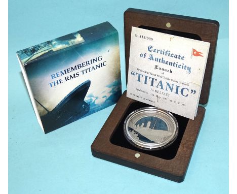 Remembering The RMS Titanic, a 2021 Solomon Islands ten-dollar 3oz silver coin, with ultra-high relief and blue enamel decora